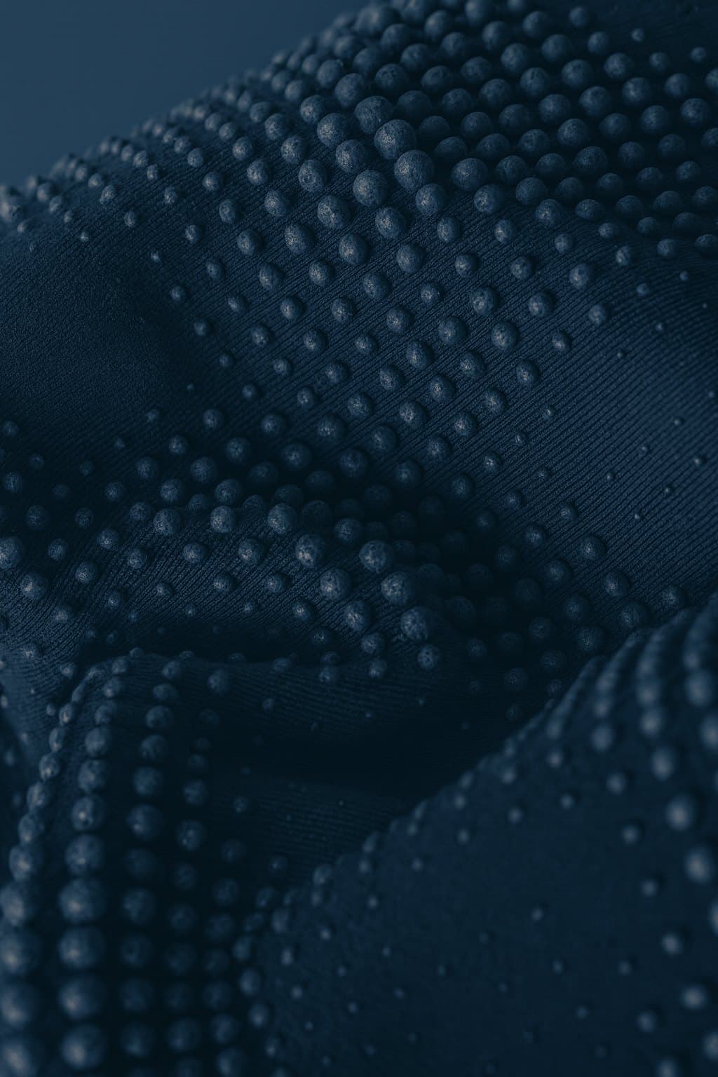 Macro detail of an engineered textile surface